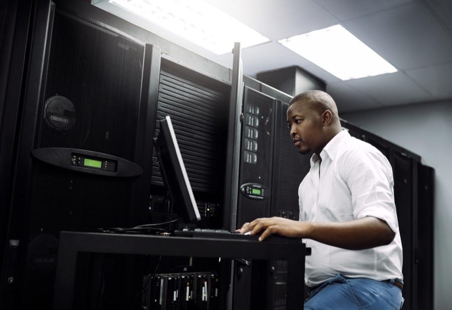 A technician working in a data center